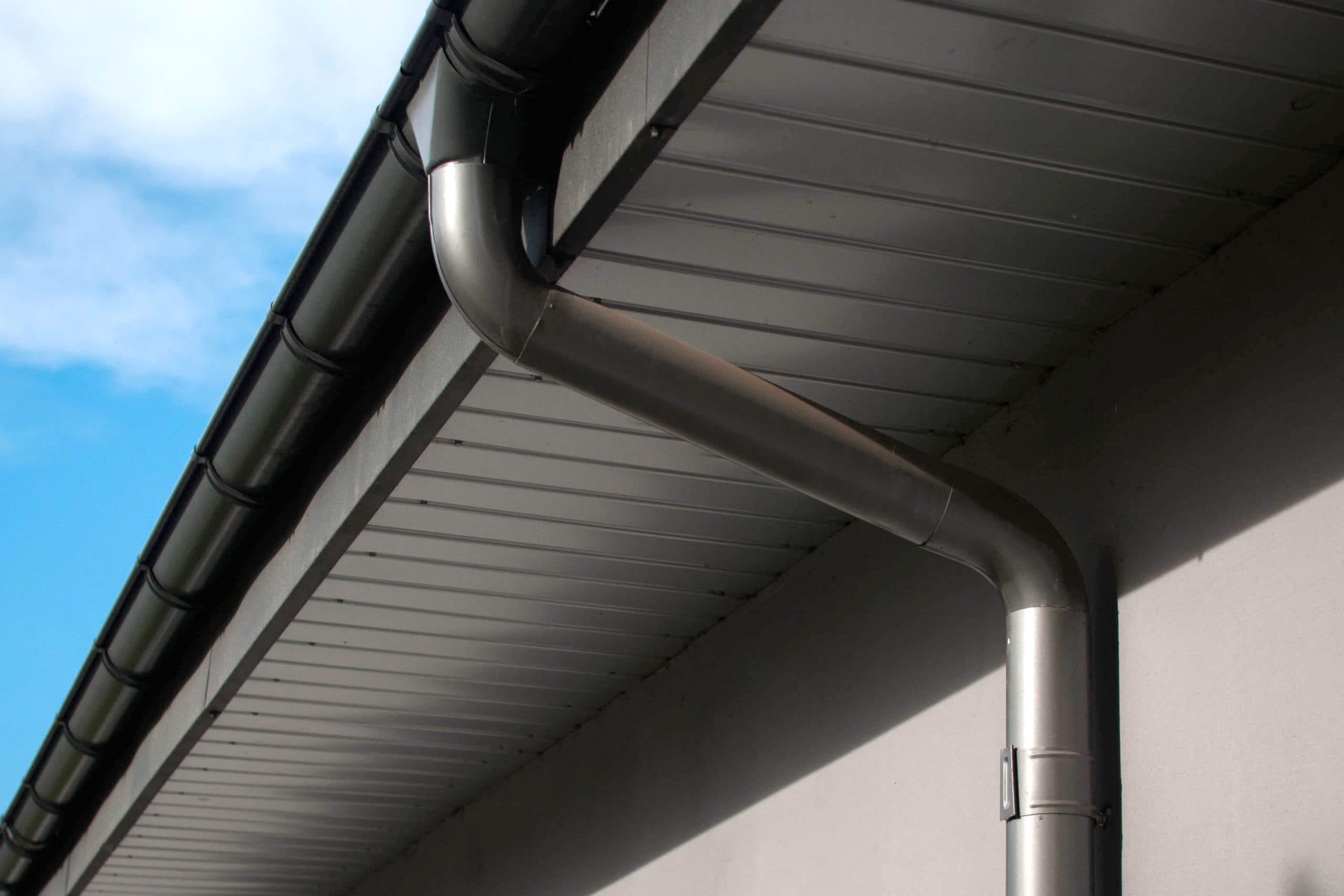 Corrosion-resistant galvanized gutters installed on a commercial building in Round Rock